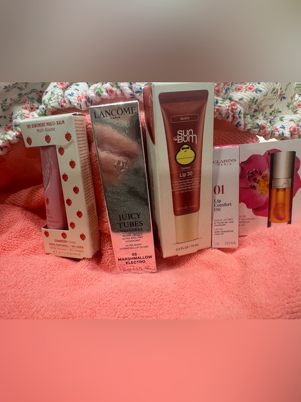 Lip bundle Lamcome, Lanolips, Sun Bum and Clarins lip oil